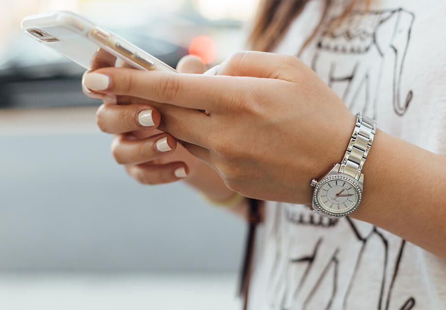 Hands holding a smartphone