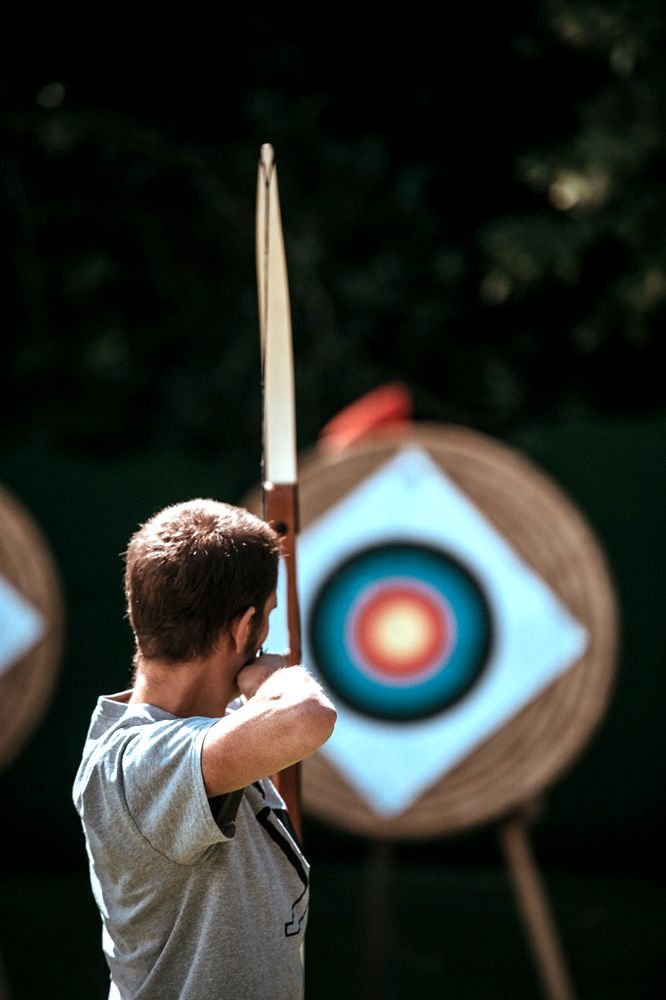 Archer aiming at a target